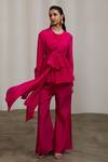 Sheela Suthar_Fuchsia Crepe, Silk Round Neck Tie-up Top And Flared Pant Set _Online_at_Aza_Fashions