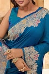 Samyukta Singhania_Blue Brocade, Silk Zari, Tassels Sweetheart Neck Bloom Pattern Saree With Blouse _Online