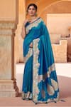Buy_Samyukta Singhania_Blue Brocade, Silk Zari, Tassels Sweetheart Neck Bloom Pattern Saree With Blouse _at_Aza_Fashions