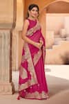 Samyukta Singhania_Pink Brocade, Silk Zari, Tassels Boat Neck Bloom Woven Saree With Blouse _at_Aza_Fashions