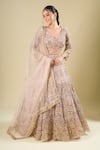 Shop_Azeera_Peach Net Sequins, Embroidery, Zari V-neck Lehenga Set _Online_at_Aza_Fashions