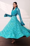 Style Junkiie Teal Crepe Embroidery The Knot Seafoam Lehenga Online at Aza Fashions Style Junkiie_Teal Crepe Embroidery The Knot Seafoam Lehenga _Online_at_Aza_Fashions