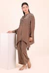 Buy Myra Clothing Line Brown Crepe Embroidery, Sequins, Beads, Piping Hand Work Tunic And Pant Co-ord Set at Aza Fashions Buy_Myra Clothing Line_Brown Crepe Embroidery, Sequins, Beads, Piping Hand Work Tunic And Pant Co-ord Set _at_Aza_Fashions