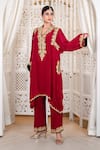 Daljit Sudan_Red Crepe Embroidery, Zari V-neck Tilla Phiran And Pant Set _at_Aza_Fashions