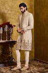 Histori_Beige Tussar, Cotton, Silk Embroidery, Beads Woven Booti Sherwani Set _at_Aza_Fashions