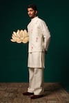 Shop Niloufer By Aasif Ally White Silk Embroidery, Stones Hand-painted Tulip Nehru Jacket Kurta And Pant Set Online at Aza Fashions Shop_Niloufer By Aasif Ally_White Silk Embroidery, Stones Hand-painted Tulip Nehru Jacket Kurta And Pant Set _Online_at_Aza_Fashions