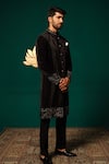 Shop Niloufer By Aasif Ally Black Silk Embroidery, Zari Zardozi Handwork Sherwani And Pant Set Online at Aza Fashions Shop_Niloufer By Aasif Ally_Black Silk Embroidery, Zari Zardozi Handwork Sherwani And Pant Set _Online_at_Aza_Fashions
