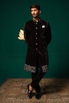 Niloufer By Aasif Ally Black Silk Embroidery, Zari Zardozi Handwork Sherwani And Pant Set at Aza Fashions Niloufer By Aasif Ally_Black Silk Embroidery, Zari Zardozi Handwork Sherwani And Pant Set _at_Aza_Fashions