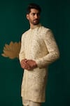 Niloufer By Aasif Ally_Ivory Silk Embroidery, Stones, Mirrors Cut Dana Zardozi And Handwork Sherwani Set _at_Aza_Fashions