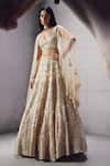 Buy Awigna Ivory Net Embroidery, Beads, Sequins V-neck Bridal Lehenga Set Online at Aza Fashions Buy_Awigna_Ivory Net Embroidery, Beads, Sequins V-neck Bridal Lehenga Set _Online_at_Aza_Fashions