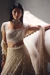 Buy_Awigna_Ivory Net Embroidery, Sequins, Beads, Stones Square Neck Lehenga Set _Online_at_Aza_Fashions