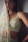 Awigna_Green Net Embroidery, Beads, Sequins, Zari Sage Embellished Lehenga Set _Online_at_Aza_Fashions