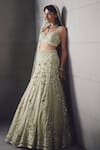 Shop_Awigna_Green Net Embroidery, Beads, Sequins, Zari Sage Embellished Lehenga Set _Online_at_Aza_Fashions