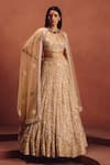 Buy Awigna Beige Net Crystals, Embroidery, Sequins, Mirrors Champagne Bridal Lehenga Set at Aza Fashions Buy_Awigna_Beige Net Crystals, Embroidery, Sequins, Mirrors Champagne Bridal Lehenga Set _at_Aza_Fashions