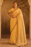 Buy_AFRIYA_Gold Organza, Chanderi Sequins, Tassels, Zari, Saree With Blouse _at_Aza_Fashions