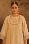 AFRIYA_Cream Chanderi , Organza Gota Patti, Metallic Border A-line Kurta Set _at_Aza_Fashions