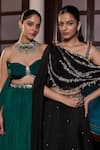 Seema Thukral_Black Chiffon, Georgette, Satin Sonam Embellished Asymmetric Blouse With Skirt _at_Aza_Fashions