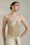 Libas Cafe by Nidhi & Ashish_Gold Lycra, Net Sequins, Beads Champagne Embroidered Corset With Dhoti Skirt _at_Aza_Fashions