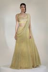 Shop_Libas Cafe by Nidhi & Ashish_Gold Lycra Glitter, Embroidery, Metallic Noorish Draped Lehenga With Blouse _at_Aza_Fashions