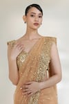 Shop_Libas Cafe by Nidhi & Ashish_Gold Net Sequins, Embroidery Sweetheart Neck Glam Pre-draped Saree With Blouse _Online_at_Aza_Fashions