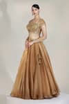 Libas Cafe by Nidhi & Ashish_Gold Organza Embroidery, Tassels, Sequins, Zari, Applique Lustre Lehenga Set _Online_at_Aza_Fashions