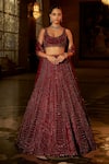 Buy_Seema Gujral_Maroon Net Crystals, Sequins, Beads, Tassels, Embroidery Bridal Lehenga Set _at_Aza_Fashions