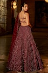 Seema Gujral_Maroon Net Crystals, Sequins, Beads, Tassels, Embroidery Bridal Lehenga Set _Online_at_Aza_Fashions