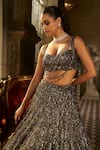 Seema Gujral_Charcoal Organza, Net Sequins, Tassels Sweetheart Neck, Embroidered Lehenga Set _at_Aza_Fashions