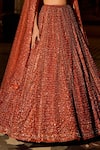 Shop_Seema Gujral_Orange Net Crystals, Sequins, Beads, Tassels, Embroidery Copper Lehenga Set _Online_at_Aza_Fashions