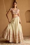 SUHINO Ivory Tissue, Organza Embroidery, Mirrors, Sequins, Piping V-neck Lehenga Set at Aza Fashions SUHINO_Ivory Tissue, Organza Embroidery, Mirrors, Sequins, Piping V-neck Lehenga Set _at_Aza_Fashions