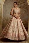 Buy_SUHINO_Ivory Tissue, Organza Embroidery, Mirrors, Sequins, Zari Round Neck Lehenga Set _at_Aza_Fashions