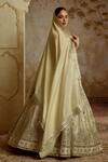 Buy_SUHINO_Ivory Tissue, Organza Embroidery, Mirrors, Zari, Sequins Round Neck Lehenga Set _at_Aza_Fashions