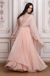 Buy_Mandira Wirk Resort_Peach Chiffon Embroidery, Sequins, Beads Round Neck Saree Gown _at_Aza_Fashions