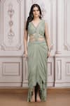 Mandira Wirk Resort_Green Lycra Sequins, Beads, Metallic Embellished Pre-draped Saree With Blouse _Online_at_Aza_Fashions