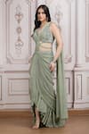 Shop_Mandira Wirk Resort_Green Lycra Sequins, Beads, Metallic Embellished Pre-draped Saree With Blouse _Online_at_Aza_Fashions