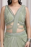 Mandira Wirk Resort_Green Lycra Sequins, Beads, Metallic Embellished Pre-draped Saree With Blouse _at_Aza_Fashions
