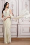 Mandira Wirk Resort_Ivory Jersey Sequins, Beads, Embellished Corset Blouse And Pre-draped Saree Set _Online_at_Aza_Fashions