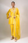 Buy_Archana Shah_Yellow Silk Embroidery, Zari, Tassels Round , Keyhole Kurta Set _at_Aza_Fashions
