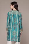 Shop Ritu Kumar Teal Viscose Mandarin Collar, V-neck Tribal Print Full Sleeve Shirt at Aza Fashions Shop_Ritu Kumar_Teal Viscose Mandarin Collar, V-neck Tribal Print Full Sleeve Shirt _at_Aza_Fashions