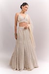 Buy_Seema Gujral_Beige Sequins, Stones, Embroidery, Beads, Tassels V-neck Mermaid Lehenga Set _at_Aza_Fashions