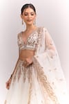 Shop_Seema Gujral_Ivory Organza Embroidery, Sequins, Zari V-neck Lehenga Set _Online_at_Aza_Fashions