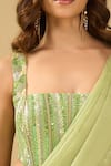 Archana Shah_Green Sequins Square Neck Ruffle Pre-draped Saree With Corset _at_Aza_Fashions