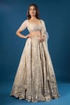 Buy_Azeera_Ivory Net Embroidery, Sequins, Zari, Beads Sweetheart Neck Lehenga Set _at_Aza_Fashions