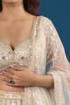 Shop_Azeera_Ivory Net Embroidery, Sequins, Zari, Beads Sweetheart Neck Lehenga Set _Online_at_Aza_Fashions