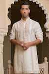 Buy_Tarun Tahiliani_Ivory Cotton, Jacquard, Suiting Textured Thread Kurta And Flared Trouser Set _Online_at_Aza_Fashions