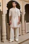Shop_Tarun Tahiliani_Ivory Cotton, Jacquard, Suiting Textured Thread Kurta And Flared Trouser Set _Online_at_Aza_Fashions