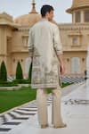 Shop_Tarun Tahiliani_Beige Cotton, Jacquard, Suiting Pichwai Print Kurta And Flared Trouser Set _at_Aza_Fashions