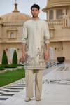 Tarun Tahiliani_Beige Cotton, Jacquard, Suiting Pichwai Print Kurta And Flared Trouser Set _Online_at_Aza_Fashions