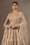 Shop_Tarun Tahiliani_Ivory Tulle, Net Beads, Sequins, Crystals, Floral Motif Hand Lehenga Set _Online_at_Aza_Fashions