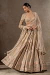 Tarun Tahiliani_Ivory Tulle, Net Beads, Sequins, Crystals, Floral Motif Hand Lehenga Set _at_Aza_Fashions